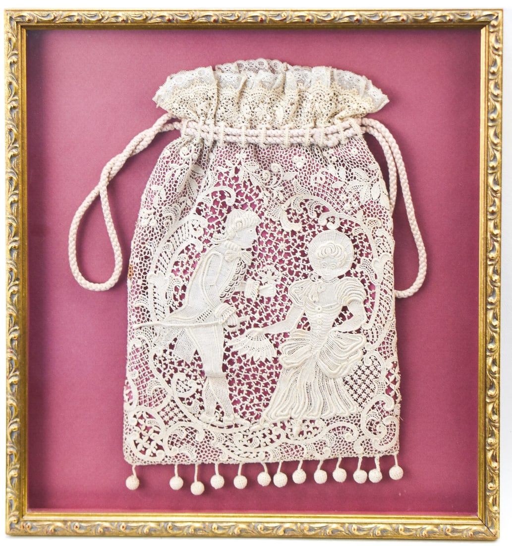 TOOKAH TURNER BAGG'S FRAMED CROCHETED EVENING PURSE: A framed crocheted evening purse featuring a courting scene purportedly belonging to Tookah Turner Bagg (1885-1974; early Muskogee, Oklahoma resident and daughter of Tookah B. Butler Turner). The
