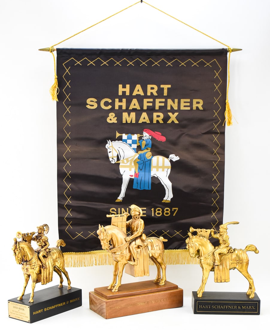 HART SCHAFFNER & MARX BANNER AND STORE DISPLAYS: A Hart Schaffner & Marx advertising banner and store displays of the herald on horse logo. One store display features a congratulations on 49 years of service from October of 1970, both are made o