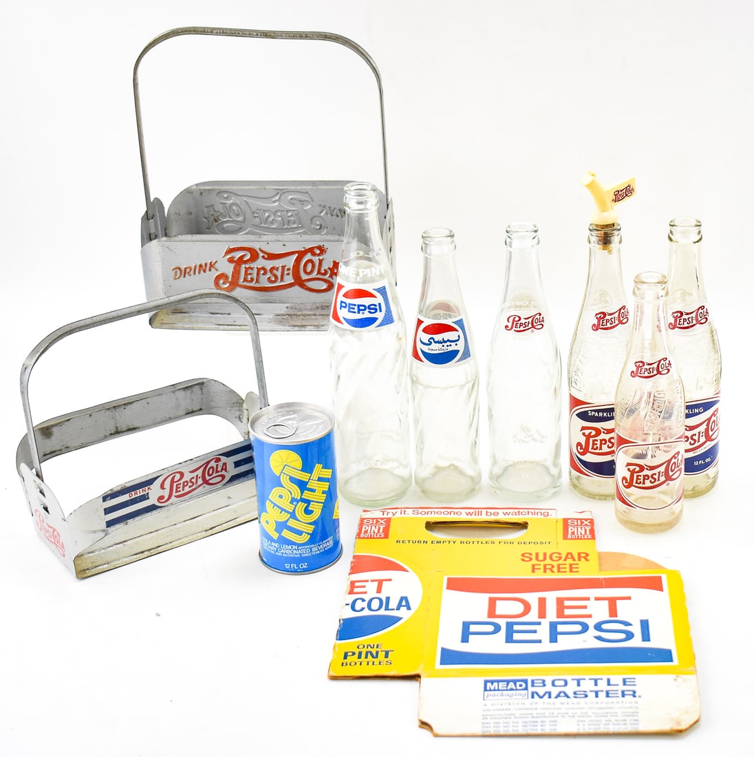 VINTAGE PEPSI BOTTLES, PEPSI LIGHT COIN BANK, & ADVERTISEMENTS: An Arabic script Pepsi bottle circa 1970s, a one pint Pepsi bottle circa 1970s, a Pepsi bottle circa 1950s, three Pepsi bottles circa 1930s-1950s, one of which has a Pepsi branded oil pour spout, a 19