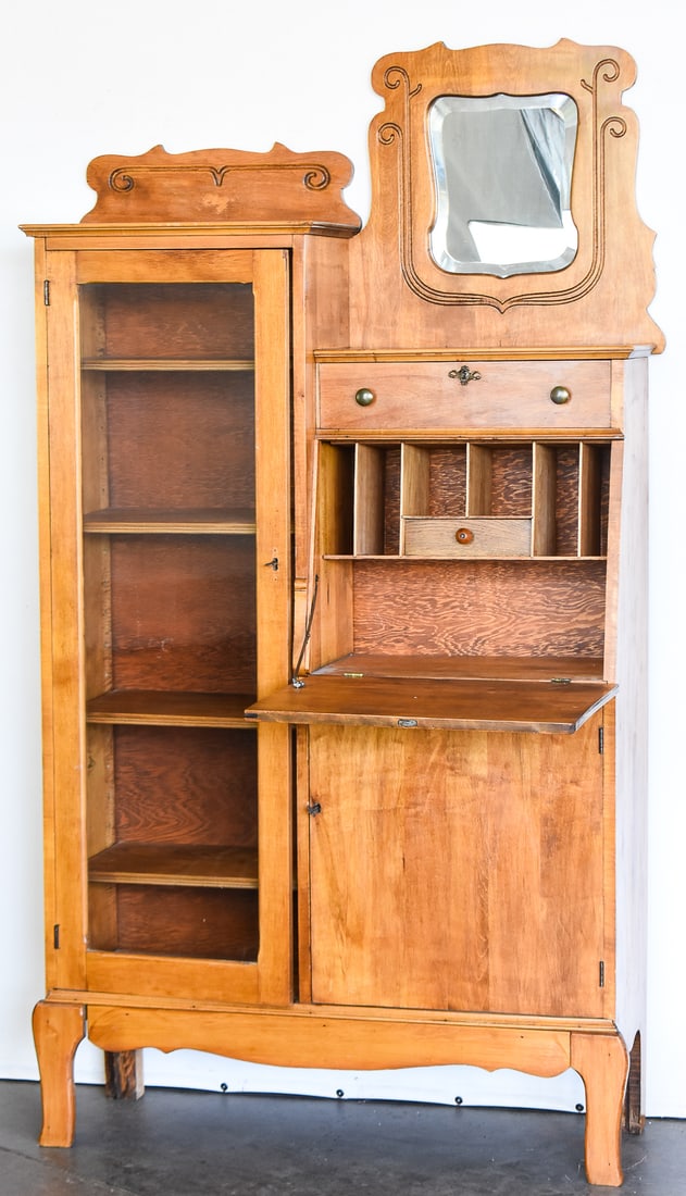 SIDE BY SIDE SERETARY DESK: A side-by-side secretary desk is an asymmetrical, multi-functional furniture piece. It combines a vertical bookcase or display cabinet with an integrated drop-front writing desk, standing next to