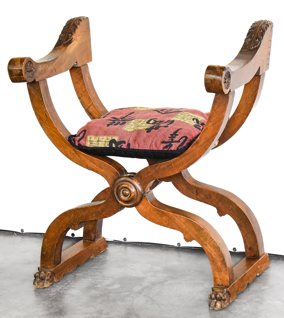 SAVONAROLA CHAIR: The chair is made from solid walnut wood in the renaissance revival style circa 19th century. The chair measures approx. 32" H x 28" W x 17.5" D. Renaissance Revival, also known as