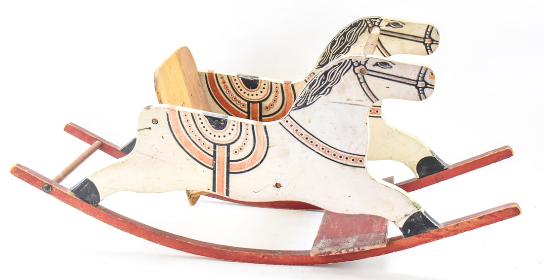 ANTIQUE SHOO-FLY DOUBLE WOODEN GLIDER ROCKING HORSE: A shoo-fly double wooden glider rocking horse, circa 1930s. The rocking horse measures approx. 16" H x 36" W x 12" D.