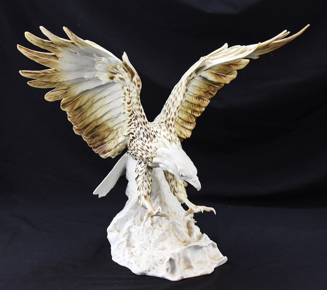 GIUSEPPE TAGLIARIOL FOR KAISER PORZELLAN "BALD EAGLE" HERRING GULL STAMP ERROR: A "Bald Eagle" porcelain sculpture made by Giuseppe Tagliariol for Kaiser Porzellan of West Germany, circa 1970s-1980s. The back of the sculpture is signed by the artist. This specific sculpture is kn