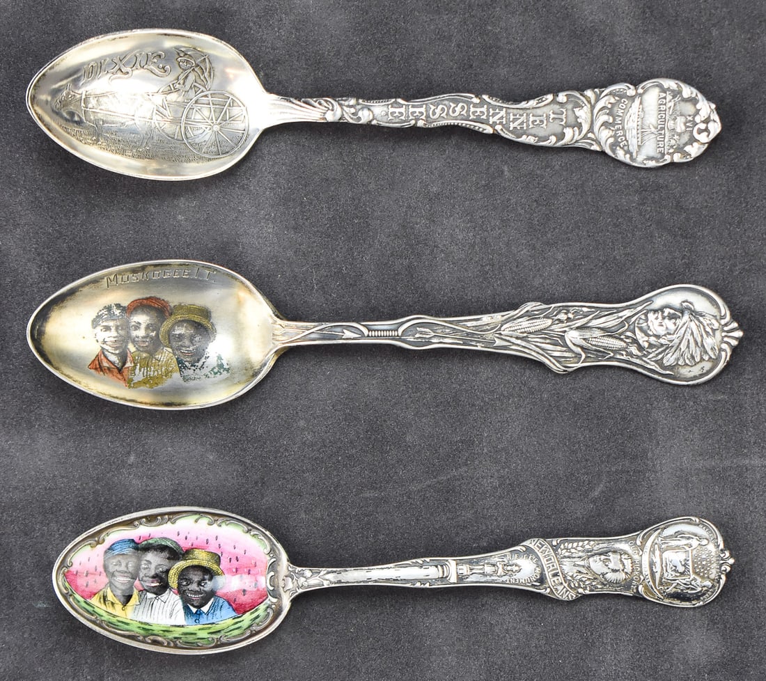 THREE STERLING SILVER BLACK AMERICANA SOUVENIR SPOONS: A set of three sterling silver souvenir spoons with Black Americana designs from Tennessee, New Orleans, and Muskogee. The spoons have a total weight of 84.3 grams. The largest spoon measures approx.