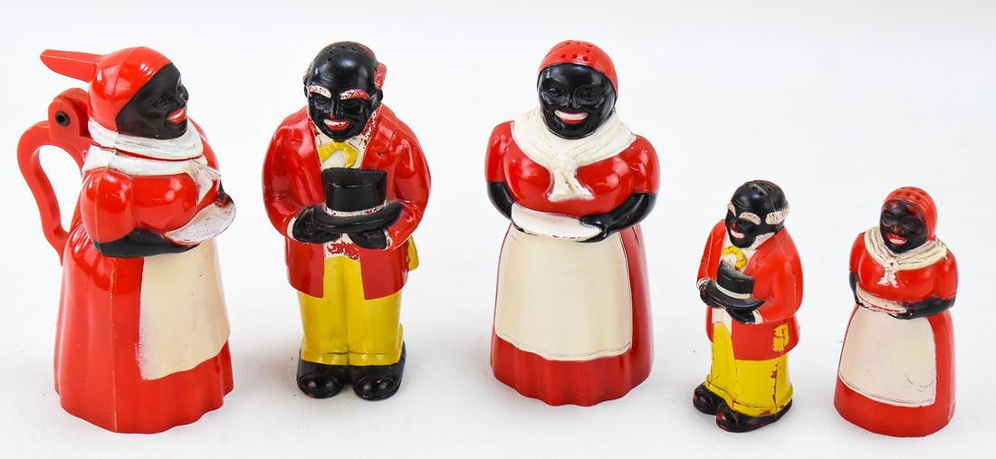 F. & F. MOLD & DIE WORKS BLACK AMERICANA AUNT JEMIMA & UNCLE MOSE SHAKERS: This lot includes five F. & F. Mold & Die Works Black Americana hard plastic items: Aunt Jemima salt shaker and syrup pitcher; Uncle Mose salt and pepper shakers. The largest item measures