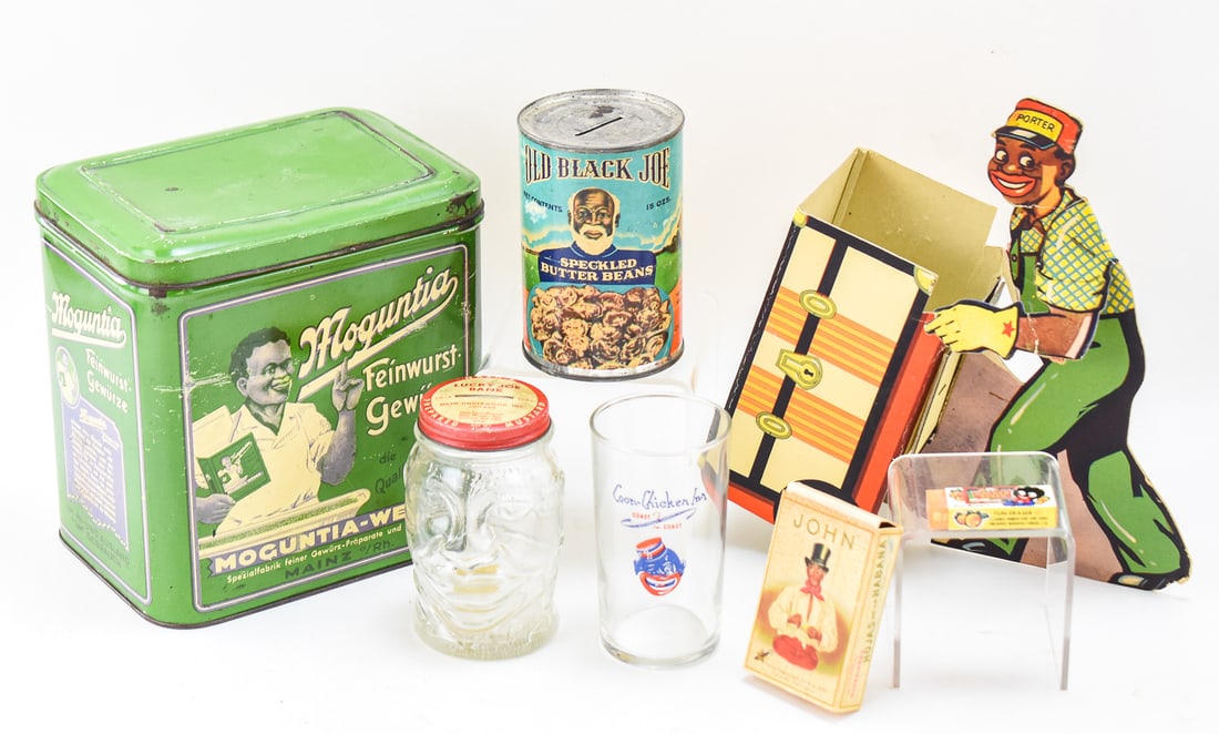 ASSORTMENT OF BLACK AMERICANA ADVERTISING COLLECTIBLES: An assortment of Black Americana advertising collectibles including a Golden Shed Fun Eraser, a vintage "John" Cuban Cigarros empty pack, a "Lucky Joe" coin bank made by Nash-Underwood Incorporated of
