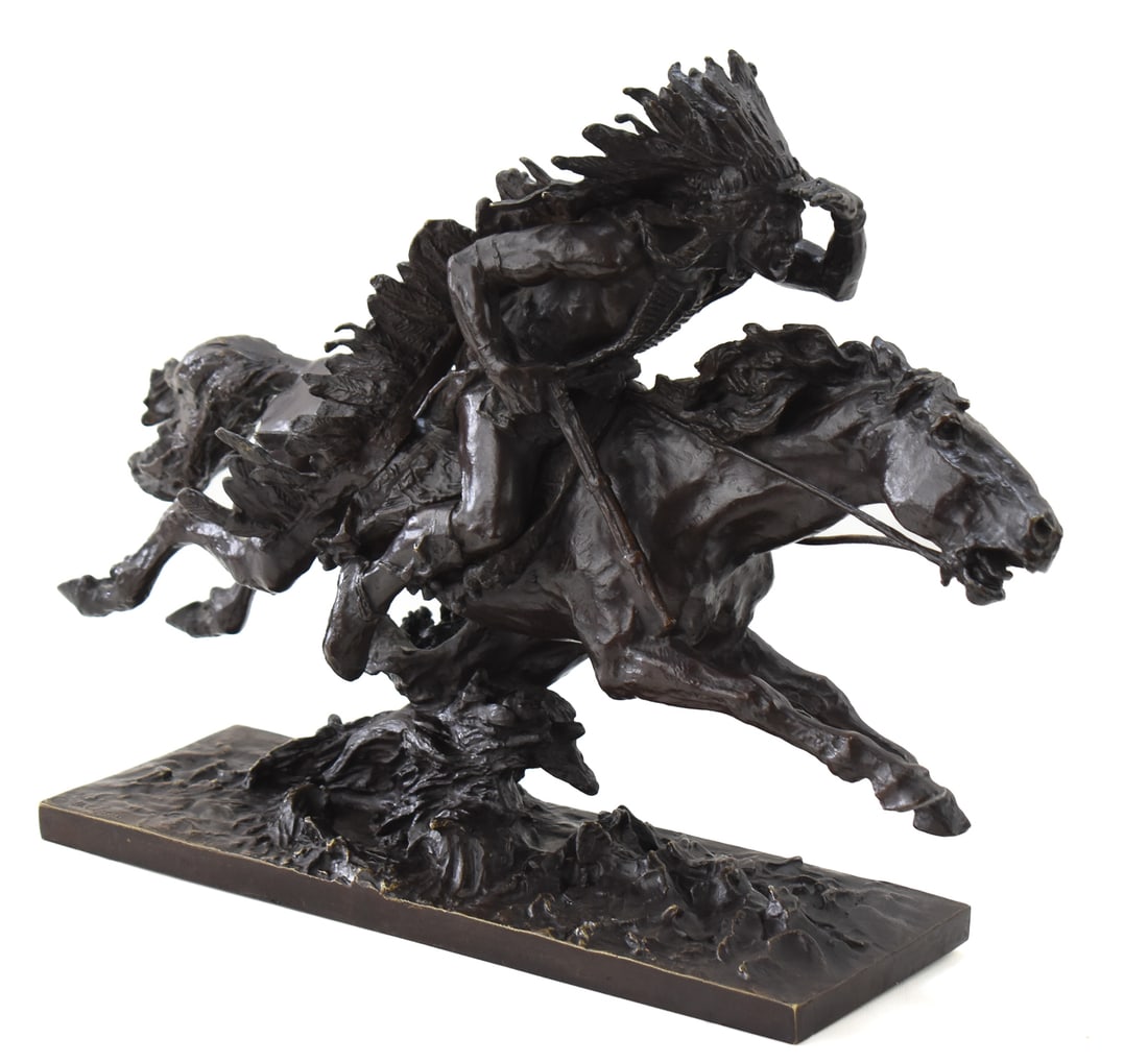 "INDIAN CHEIF ON HORSEBACK" BY ULPIANO CHECA Y SANZ: This a bronze casted sculpture designed by Ulpinoa Checa y Sanz. The base bears the mark of the M.Colin foundry in Paris France. This stamp dates this piece to be from between 1920-1950. This sculptur