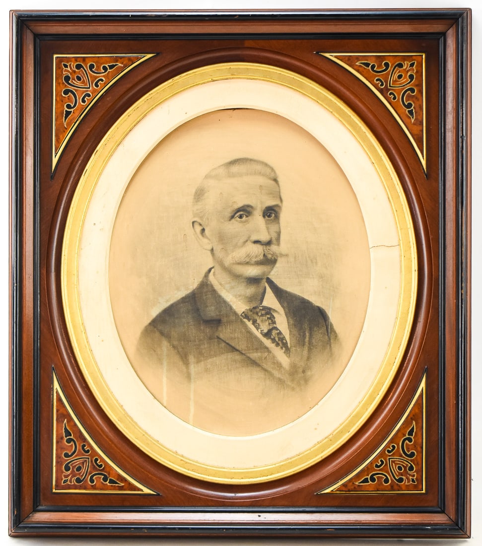 LATE 19TH CENTURY PORTRAIT IN A VICTORIAN FRAME: This Victorian frame made of walnut would make the perfect frame for a wall mirror. The portrait it currently contains is an unidentifiable sketch of a man drawn in charcoal. The frame measures approx