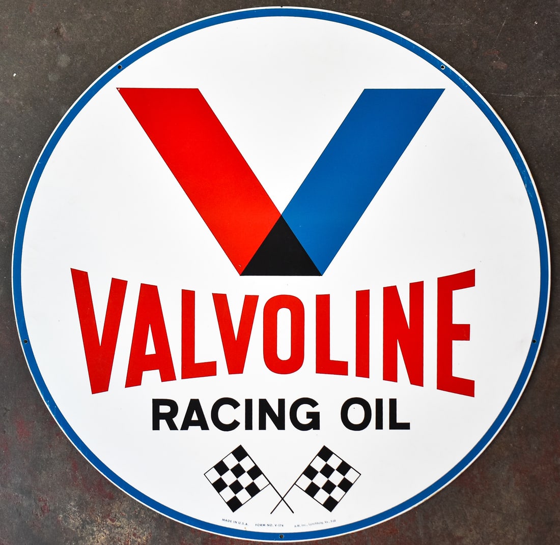 DOUBLE SIDED VALVOLINE RACING OIL SIGN: A doubled sided circular tin sign, with a manufactured date of "9-68". The sign measures approx. 30" H x 30" W x 0.5" D.