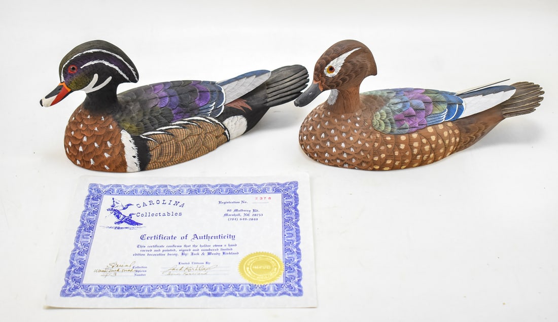 PAIR OF SIGNED DUCK DECOYS BY WENDY AND JACK KIRKLAND, ONE W/ COA: A pair of hand-carved signed duck decoys made by Wendy and Jack Kirkland of J&W Kirkland: A wood drake duck #3, registration #2378 special edition signed by both artists on the base and marked