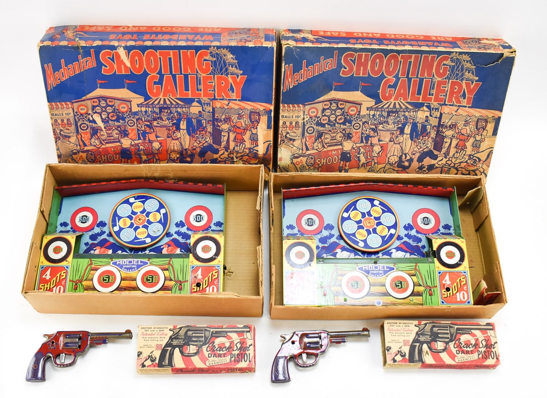 WYANDOTTE TOYS MECHANICAL SHOOTING GALLERIES: This lot contains two, in their boxes, mechanical shooting galleries from Wyandotte Toys. These boards are made of tin with wind up mechanics made in the 1930's. Each box measures approx. 12" H