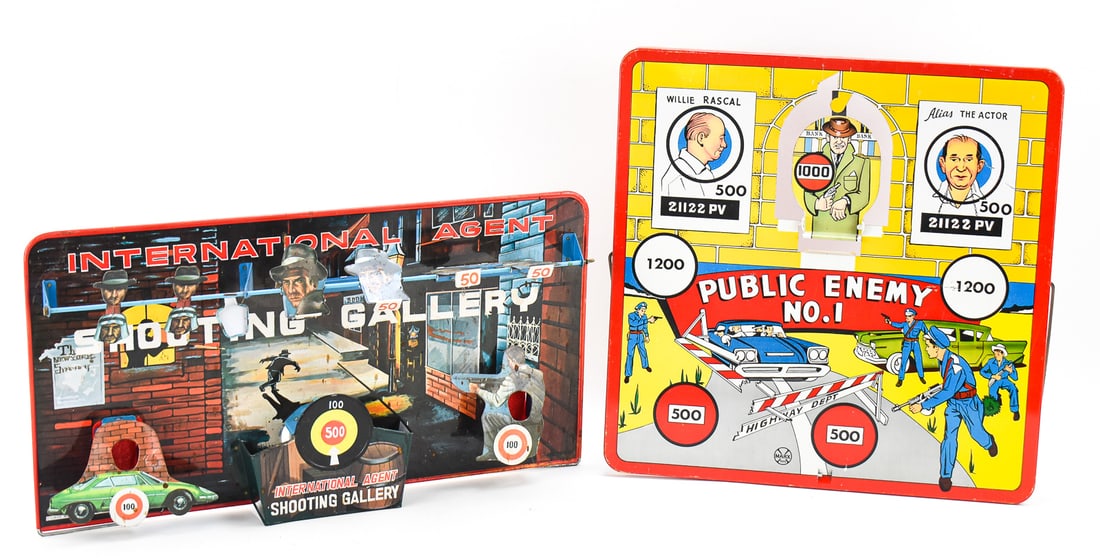 NOIR THEMED SHOOTING GALLERY BOARDS: Two noir themed tin shooting gallery boards only. Board one is the International Agent Shooting Gallery manufactured by Knickerbocker in the 1940s. Board two is Max Public Enemy No. 1 manufactured by