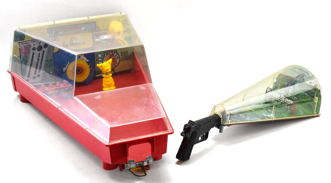 MARX SHOOTING GALLERY DUO: This lot consists of two shooting gallery toys manufactured by Louise Marx & Co. in the 1970s. Shooting gallery one is the "Shark Shoot" shooting gallery game. It was released in 1977