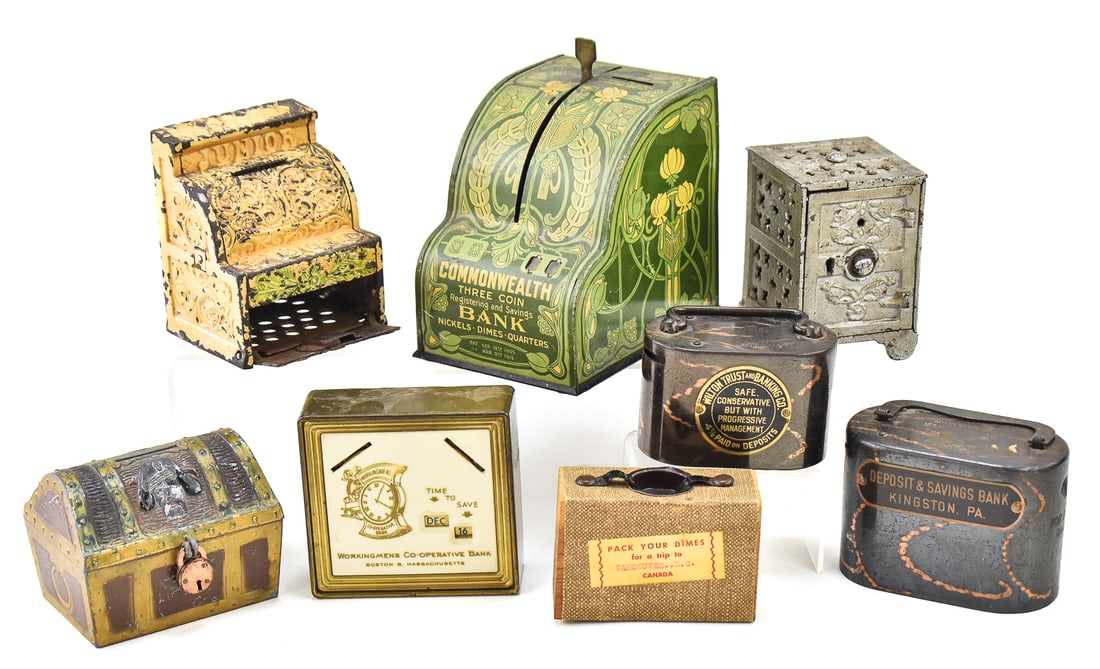 ASSORTMENT OF 8 COIN BANKS: An assortment of eight coin banks including a tin lithograph "Commonwealth Three Coin Registering and Savings Bank" circa 1915, a Deposit & Savings Bank of Kingston, PA coin and bill bank manufact
