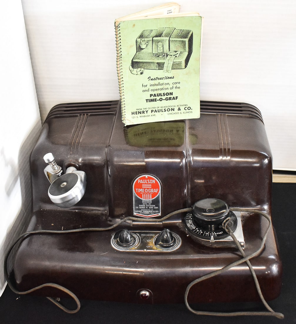 PAULSON TIME-O-GRAF: A Paulson Time-o-Graf is watch timing machine used by watchmakers to measure and adjust the accuracy of watches. These were used in the 1930s-50s and were manufactured by Henry Paulson & Co. out
