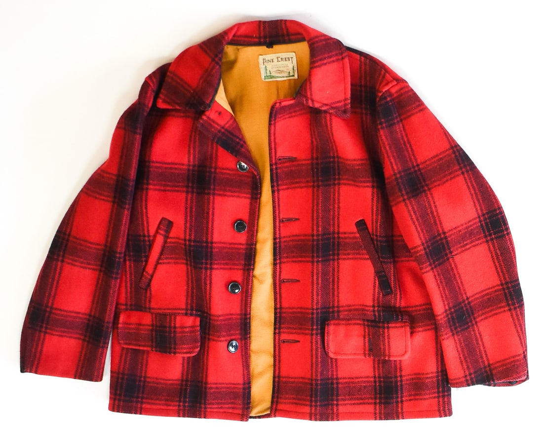 VINTAGE PINE CREST WOOL MACKINAW PLAID HUNTING COAT: A circa 1950s Pine Crest "Distinctive Sportswear" mackinaw plaid wool hunting coat with felt lining. The coat's size tag is missing but it appears to be a men's medium-large, and measures approx. 24"