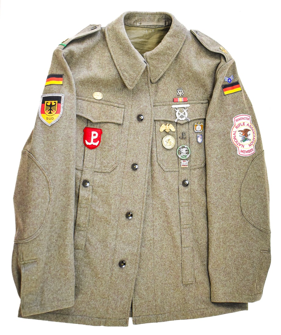 WEST GERMAN BUNDESWEHR WOOL FIELD JACKET: A West German Bundeswehr infantry wool field jacket, circa 1950s-1970s. The jacket features a "SUD" shoulder insignia indicating the uniform originated from the Territorial Command South. The jacket