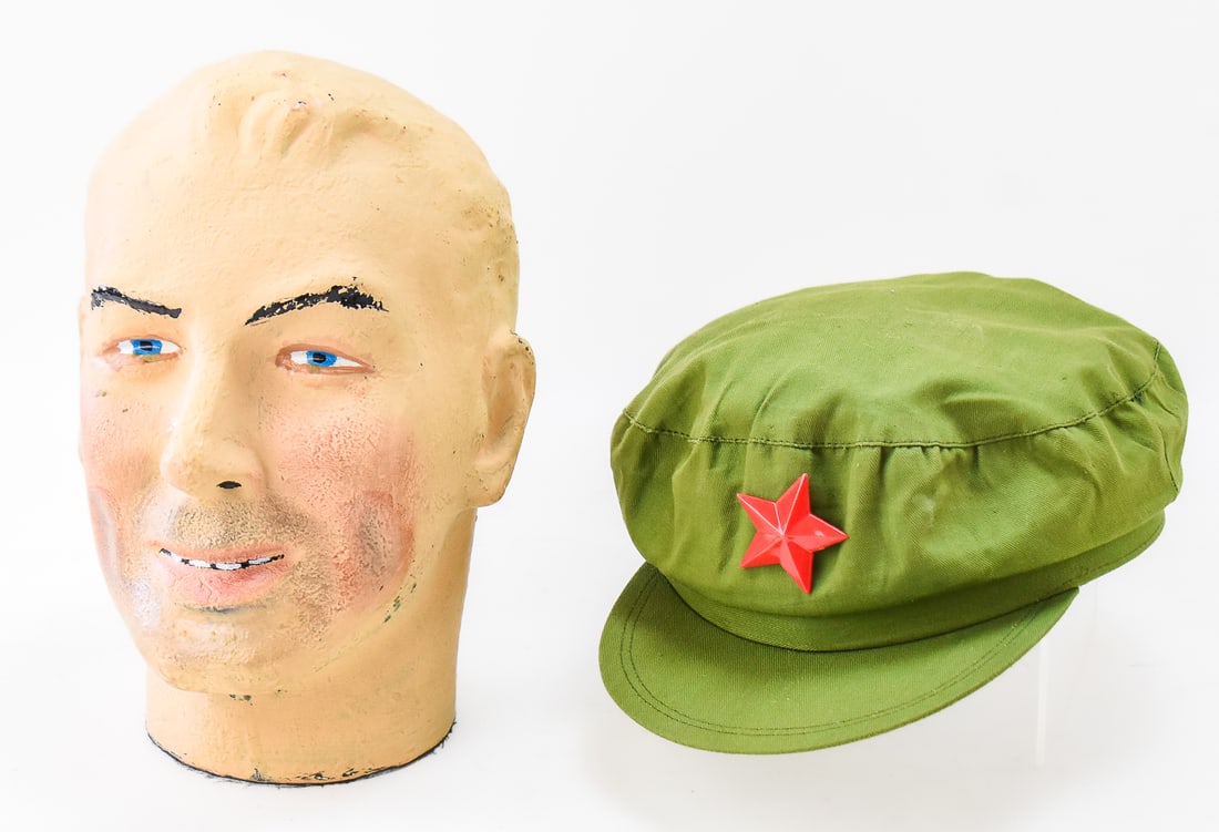 CHINESE PEOPLE'S LIBERATION ARMY TYPE 65 FIELD CAP: A Chinese People's Liberation Army Type 65 field cap, commonly referred to as a "Mao Cap", circa 1965-1985. The cap measures approx. 4" H x 8" W x 10" D.