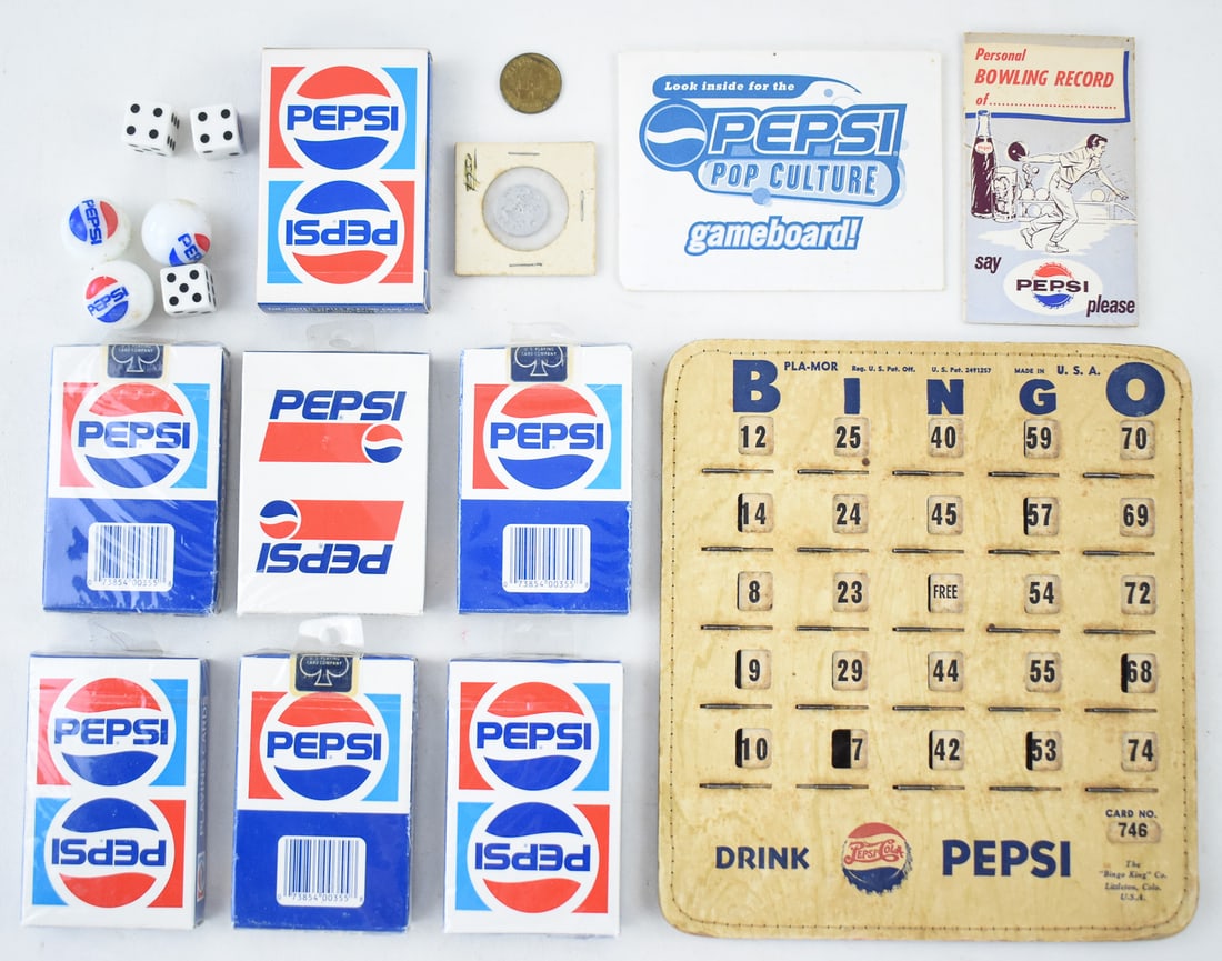 PEPSI COLLECTIBLES: PLAYNG CARDS, DICE, MARBLES, GAMES: An assortment of Pepsi collectibles including seven decks of cards, Pepsi branded marbles, Pepsi Dice, a vintage Pepsi bingo cards, Pepsi tokens, a 1997 Pepsi promotional Pop Culture game board, and P