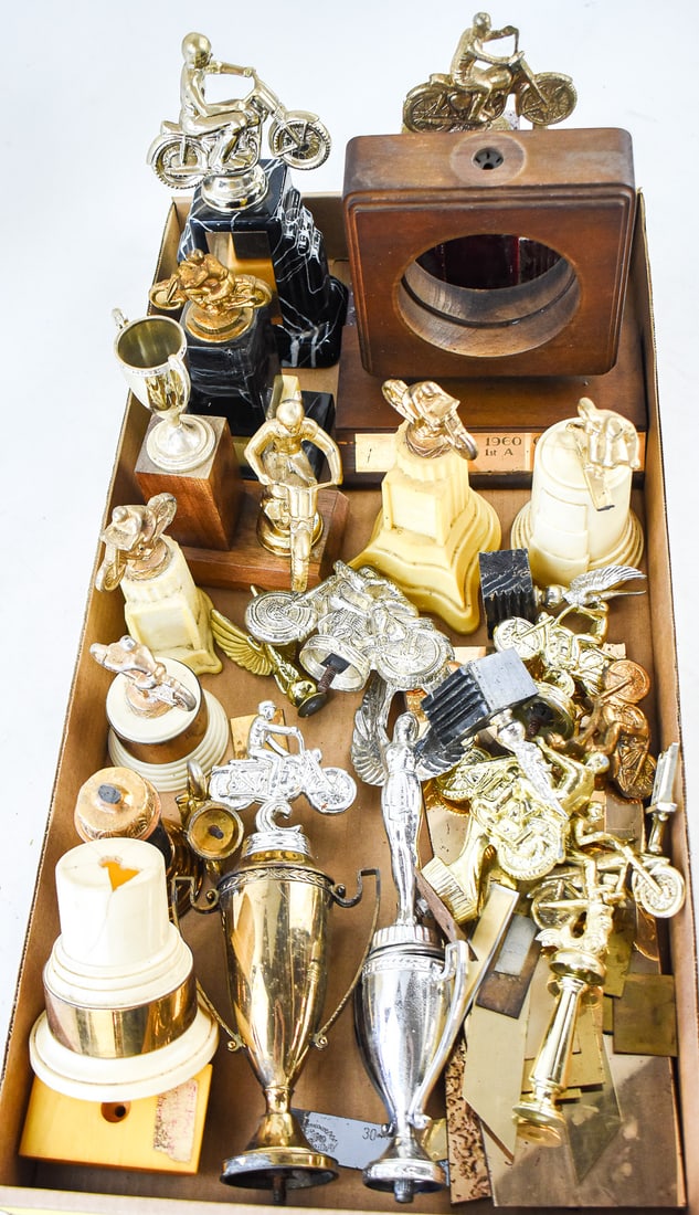 COLLECTION OF 1960s MOTORCYCLE RACING TROPHY PIECES WITH BAKELITE & MORE: A collection of six full motorcycle racing trophies as well as incomplete pieces of others. All are from Oregon races in the 1960s, originating from the John Taylor Honda Store of Woodburn, Oregon. In