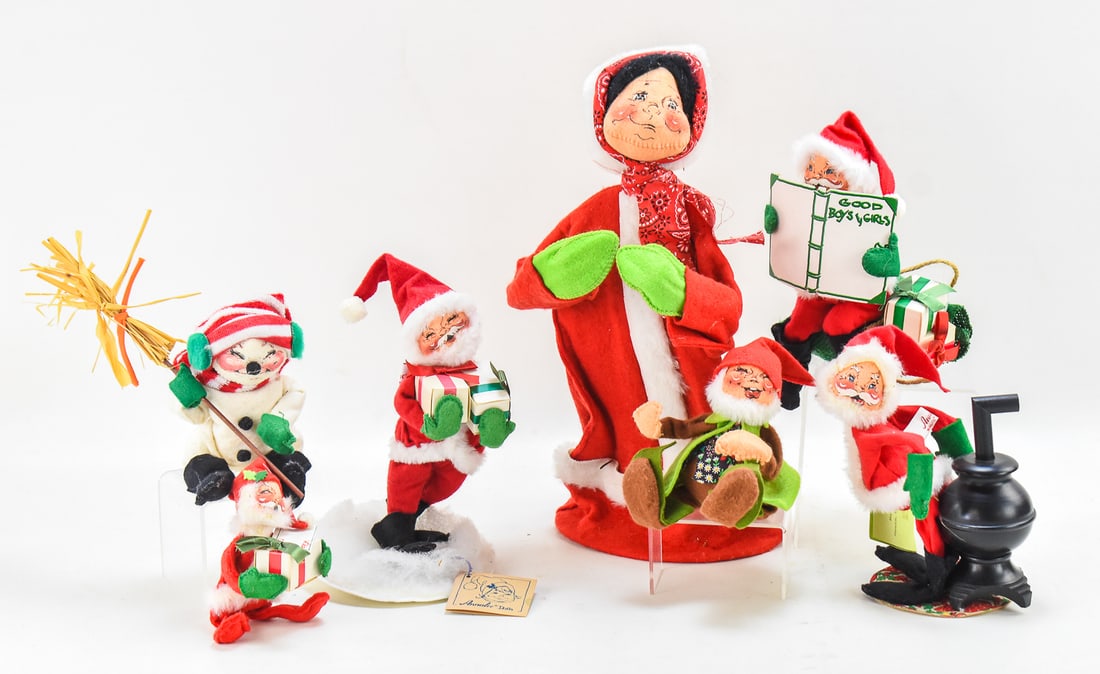 MID-CENTURY ANNALEE MOBILITEE CHRISTMAS DOLLS: Seven 1960s-70s Annelee mobilitee Christmas dolls. The largest "Christmas Caroler" measures approx. 14"H x 7"W x 6"D.