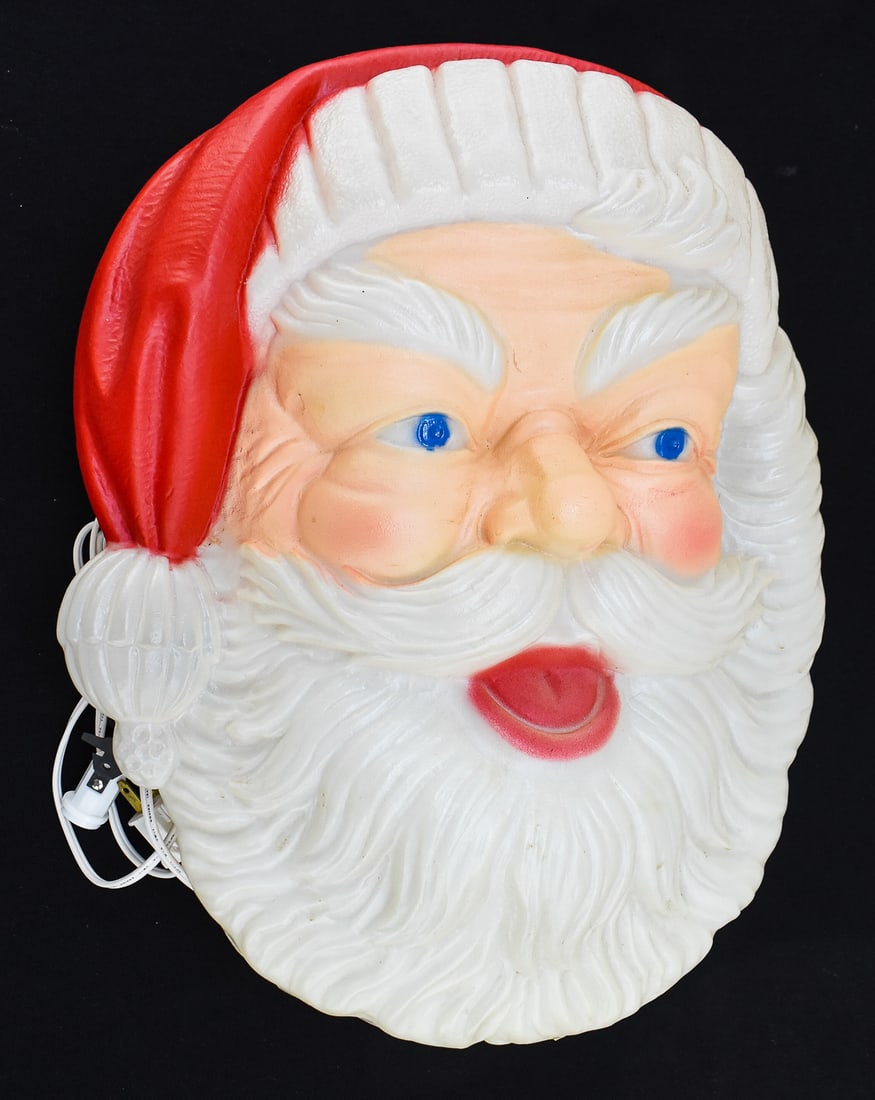 1991 TPI BLOW MOLD SANTA CLAUS FACE: A 1991 TPI lighted blow mold wall-hanging Santa Claus face. The item measures 15.5" H, 12.5" W, 5" D.