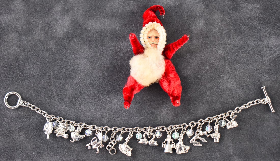 CHRISTMAS CHARM COLLECTION: This lot consists of a Christmas bracelet and a Christmas ornament. The silver toned bracelet has the "12 Days of Christmas" charms strung on it with clear beads in between each. It is 8" long. The Ch