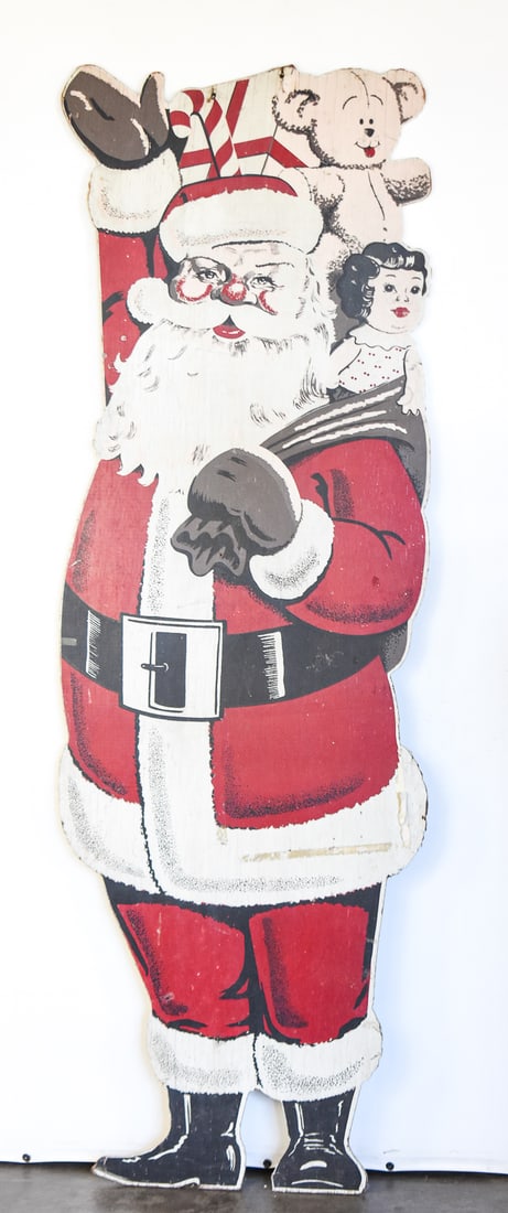 MID-CENTURY WOODEN CHRISTMAS SANTA CUT-OUT 6': A mid-century wooden Santa cut-out outdoor display measuring 72" H x 24" W x 0.5" D.