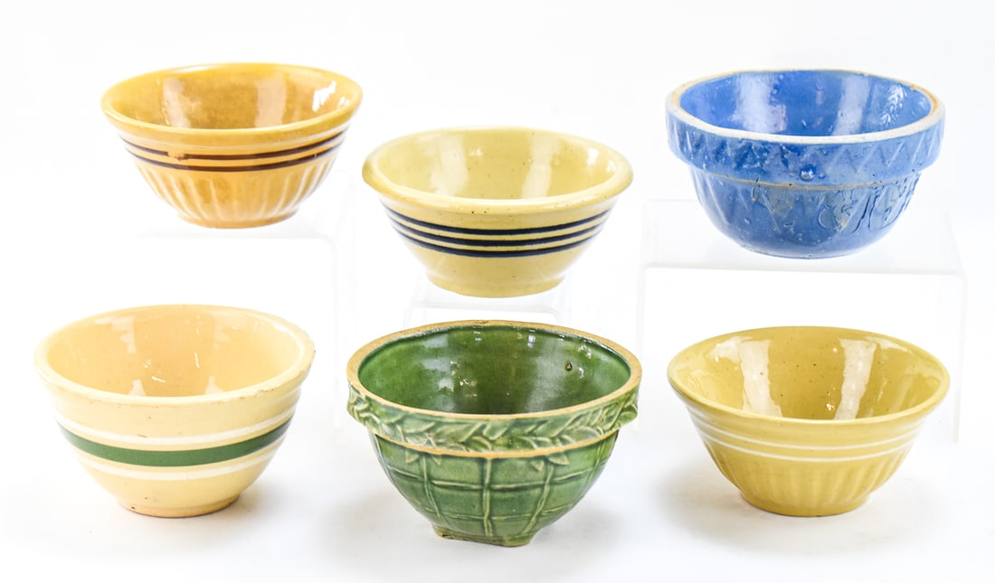 STONEWARE AND YELLOW WARE COLLECTION: 'WINDOWPANE' AND 'BANDED' PATTERNS: This lot includes a stoneware and yellow ware mixing bowl assortment, from early 20th century; in the following patterns: 'Banded', 'Windowpane', and sponge ware. They all measures approx. 3" H x