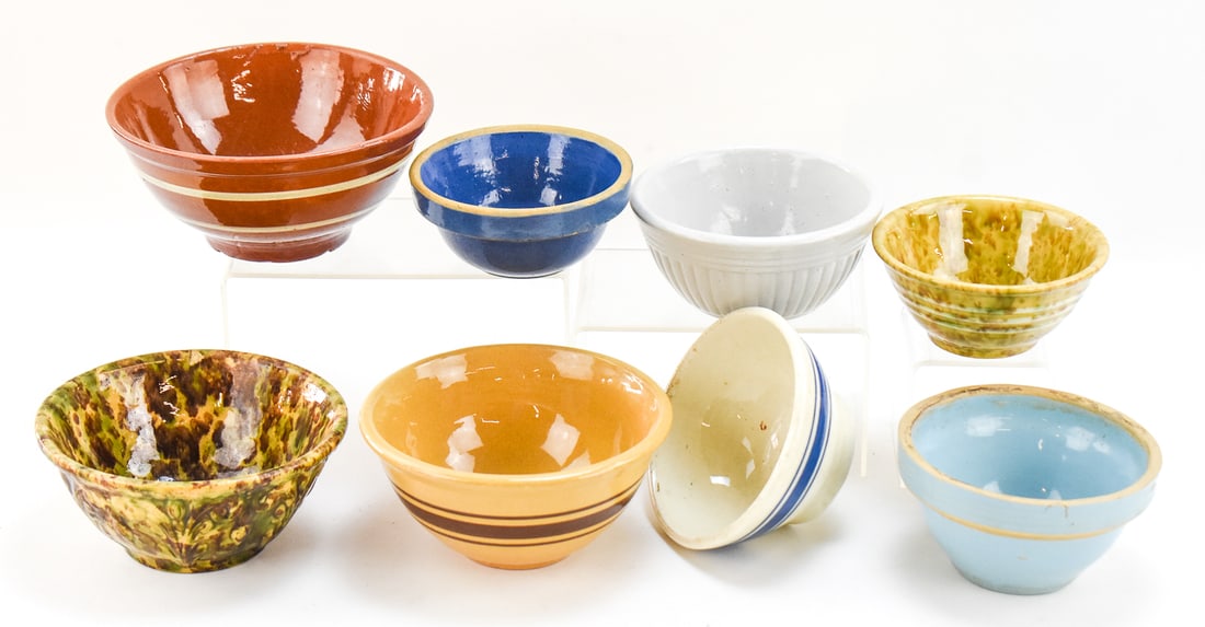 STONEWARE BOWL COLLECTION: MORTON, ROCKINGHAM-GLAZE, MONMOUTH STYLES: This lot includes eight early 20th century stoneware bowls: light blue Monmouth style ribbed bowl, Clay City (attributed) cobalt blue bowl, yellow ware brown-slip bowl, Morton Pottery 'Woodland