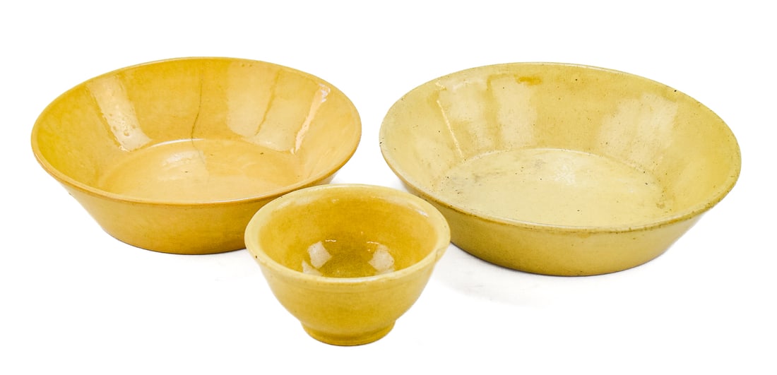 TRIAD OF YELLOW WARE BOWLS (1 of 3)