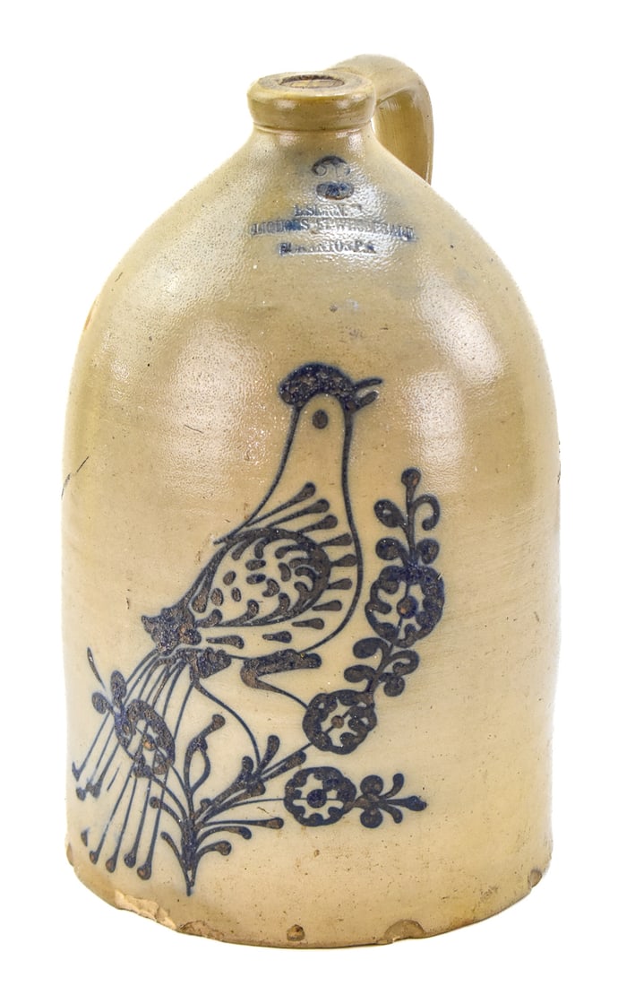 B. SIMON THREE-GALLON STONEWARE LIQUOR ADVERTISEMENT JUG: A three-gallon stoneware advertising jug for B. Simon wholesale liquor retailer (Scranton, PA) featuring a bird motif, from mid-19th century. Jug measures approx. 17" H x 9.5" W x 9.5" D.