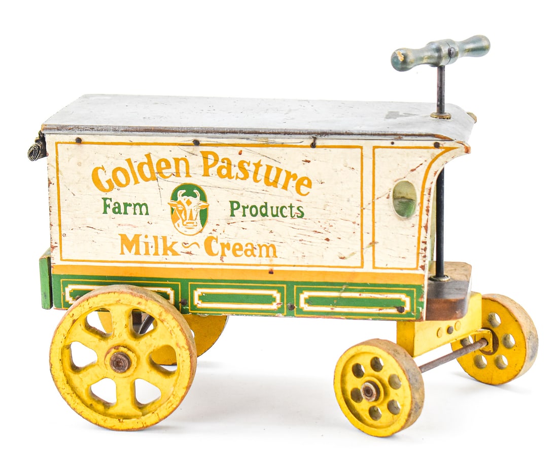 JACRIM MANUFACTURING COMPANY "GOLDEN PASTURE" MILK WAGON PULL-TOY (1 of 3)