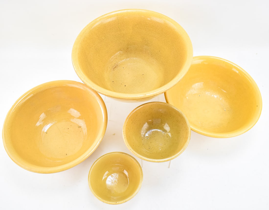 FIVE 'DANDY LINE' YELLOW WARE BOWLS - 2