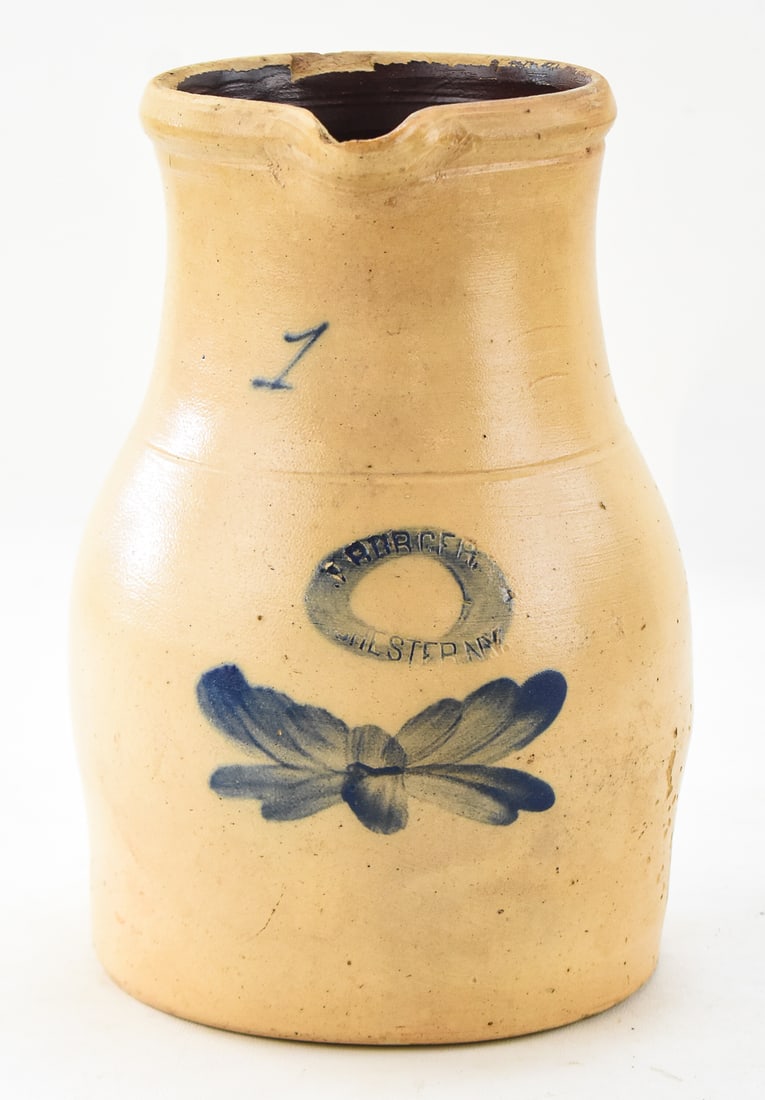 J. BURGER & CO. 1 GALLON PITCHER: This stoneware pitcher from J. Burger & Co. in Rochester, New York, features a cobalt butterfly motif and measures approx. 11" H x 9" W x 7" D.