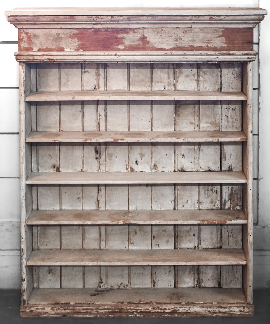 RUSTIC PINE WOOD PANTRY SHELF: A pine pantry shelf with six shelves, late 19th-early 20th century. The item measures approx. 44.5" H x 36.5" W x 8" D.