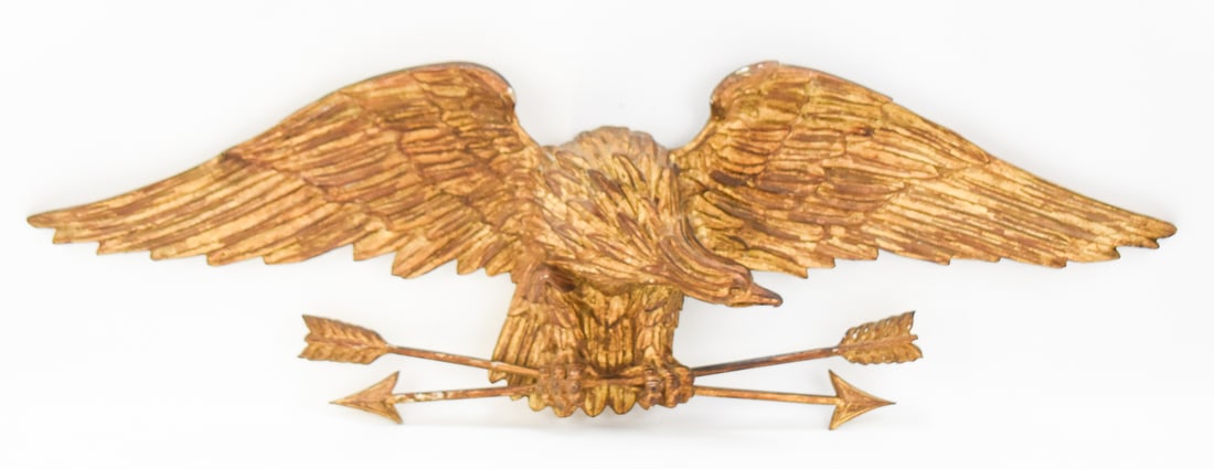 PALLADIO AMERICAN FEDERAL REVIVAL STYLE GILTWOOD EAGLE WALL PLAQUE: A Palladio (Italy) marked American Federal Revival style giltwood eagle wall plaque, from mid-20th century. The item measures approx. 13" H x 42" W x 3" D.