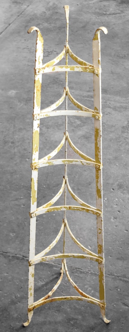 ANTIQUE WHITE WROUGHT IRON POT RACK: A antique white painted wrought iron pot rack measuring approx. 43" H x 7.5" W x 7.5" D.