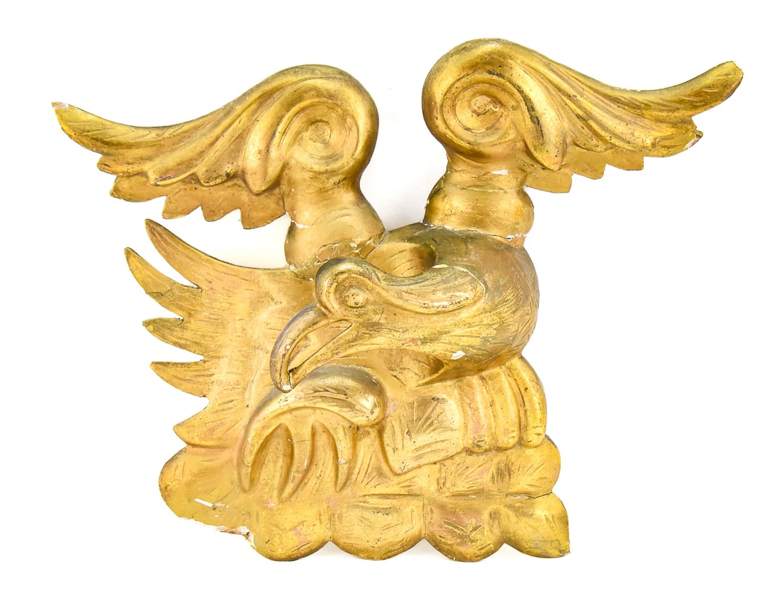 REGENCY REVIVAL STYLE EAGLE WALL PLAQUE: A Regency Revival style giltwood eagle wall plaque, from mid-20th century. The item measures approx. 12.5" H x 16" W x 5" D.