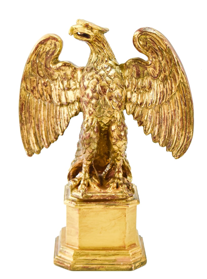 ITALIAN FEDERAL-STYLE GILTWOOD EAGLE CARVING: A mid 20th-century Federal-style giltwood eagle carving by Paladio of Italy measuring approx. 16" H x 12" W x 6" D.
