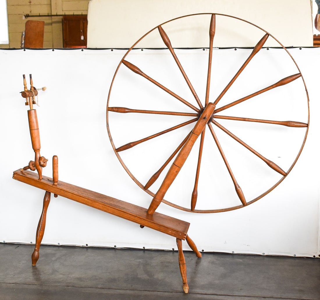 WALKING WHEEL WITH MINOR'S HEAD MECHANISM: This walking wheel features a Fred B. Pierce Co. accelerated wheel head label though the actual wheel of this piece is missing. These "Minor's Head" mechanisms allowed for much faster spindle