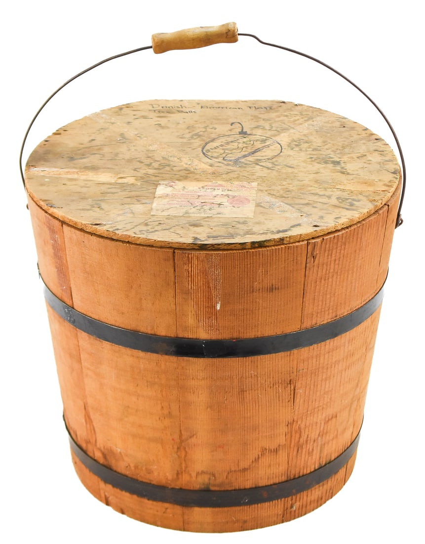 AMERICAN PINE STAVED PLANT BUCKET: An American staved pine plant bucket with metal banding, from late 19th to early 20th century. The bucket has a shipping label which indicates that it was utilized by the Sherwood Bulb Garden, OR.