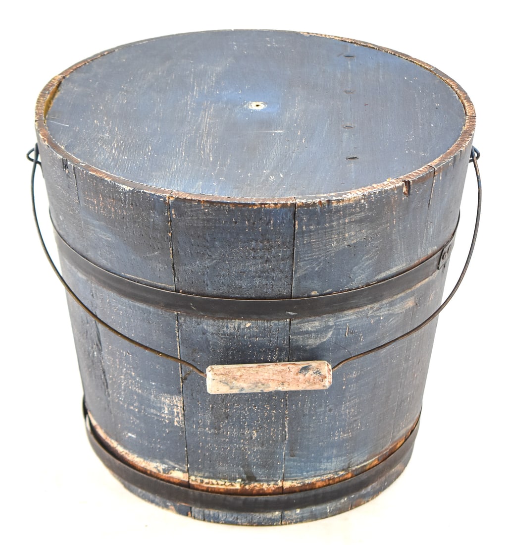 BLUE STAVE PLANT BUCKET: This made using pine staves fitted tightly together and secured with bands. Bucket has its original late 19th century paint. Bucket measures approx.10.5" H x 12" W x 12" D.