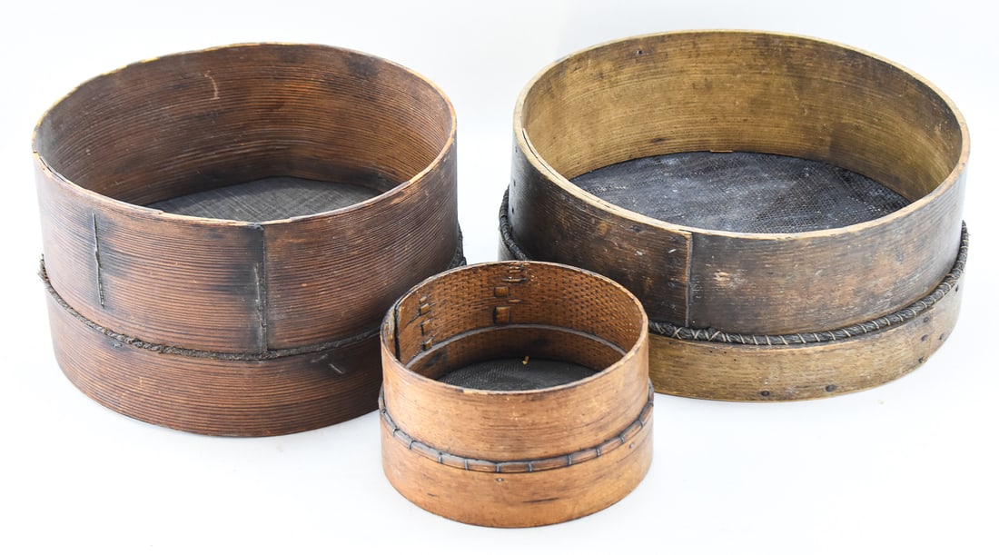 THREE BENTWOOD GRAIN SIEVES; C. LATE 19TH CENTURY: This lot includes three bentwood grain sieves in various sizes, from late 19th century. The largest item measures approx. 6" H x 14" W x 14" D.