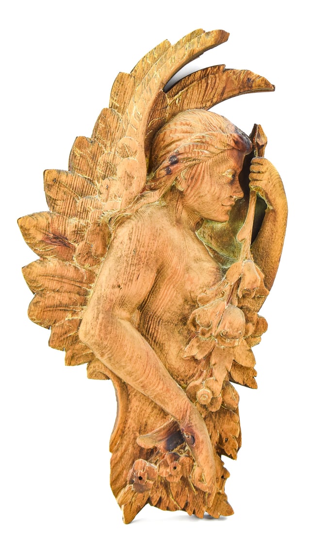 BAROQUE REVIVAL STYLE HAND-CARVED OAK WINGED ANGEL ARCHITECTURAL RELIEF: A Baroque Revival style hand-carved oak architectural relief depicting a winged angel's profile modified to be wall-art, from late 19th century. The item measures approx. 27" H x 14" W x 3.5" D.