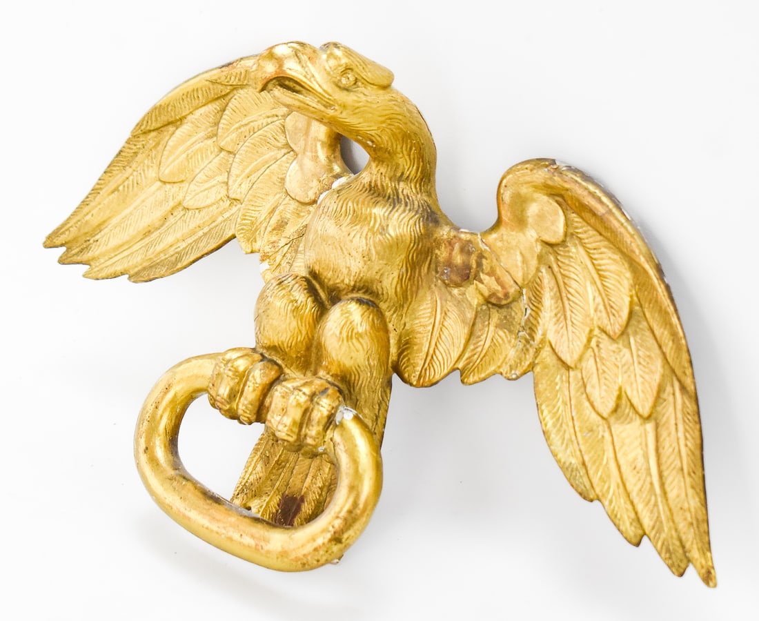 GILT PLASTER EAGLE TOWEL HANGER: A gilt plaster eagle towel hanger, mid-20th century. The item measures approx. 8.5" H x 15" W x 4" D.