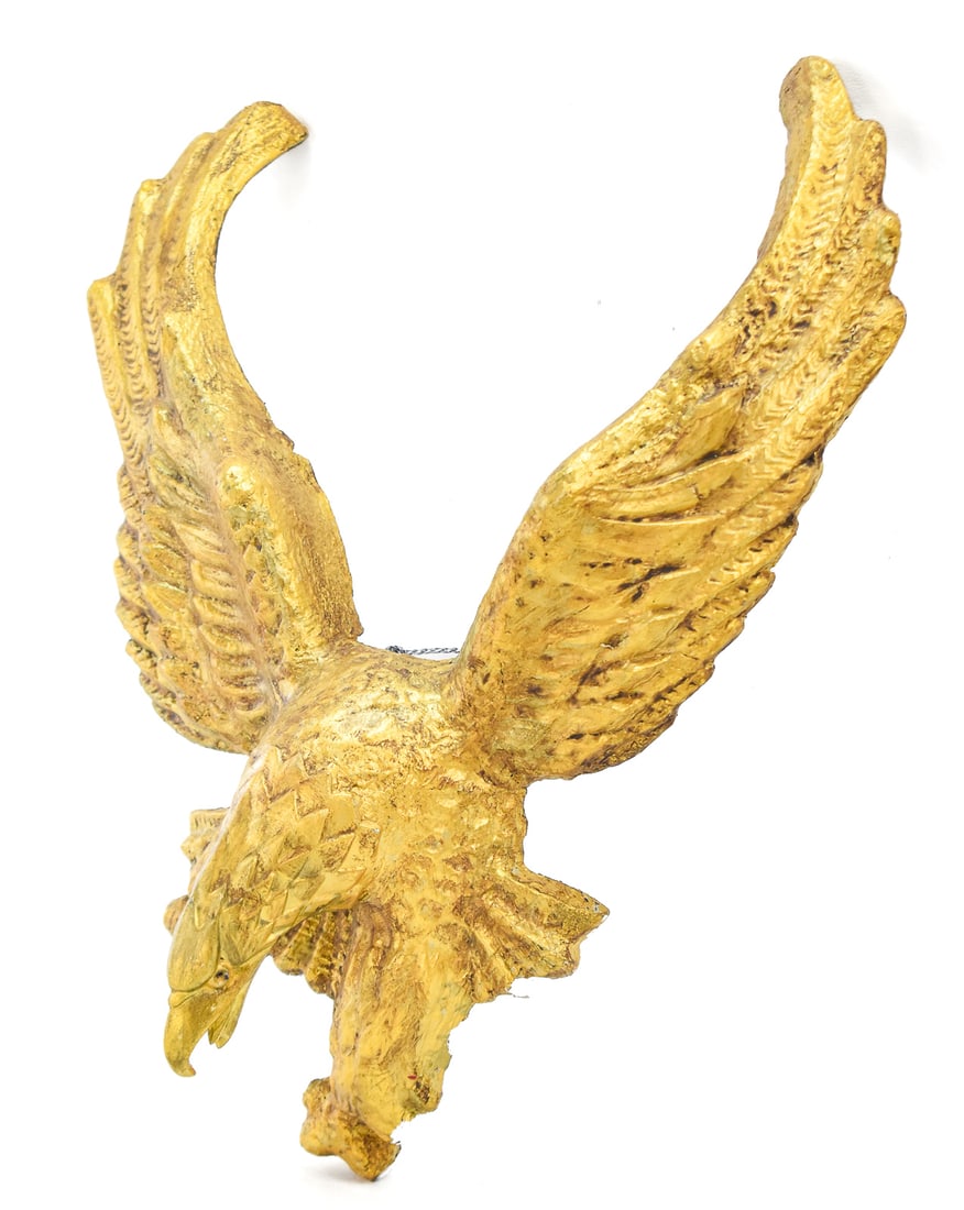 CURVED GILTWOOD EAGLE SCULPTURE: A curved giltwood carved eagle sculpture. The item measures approx. 17" H x 14" W x 5" D.