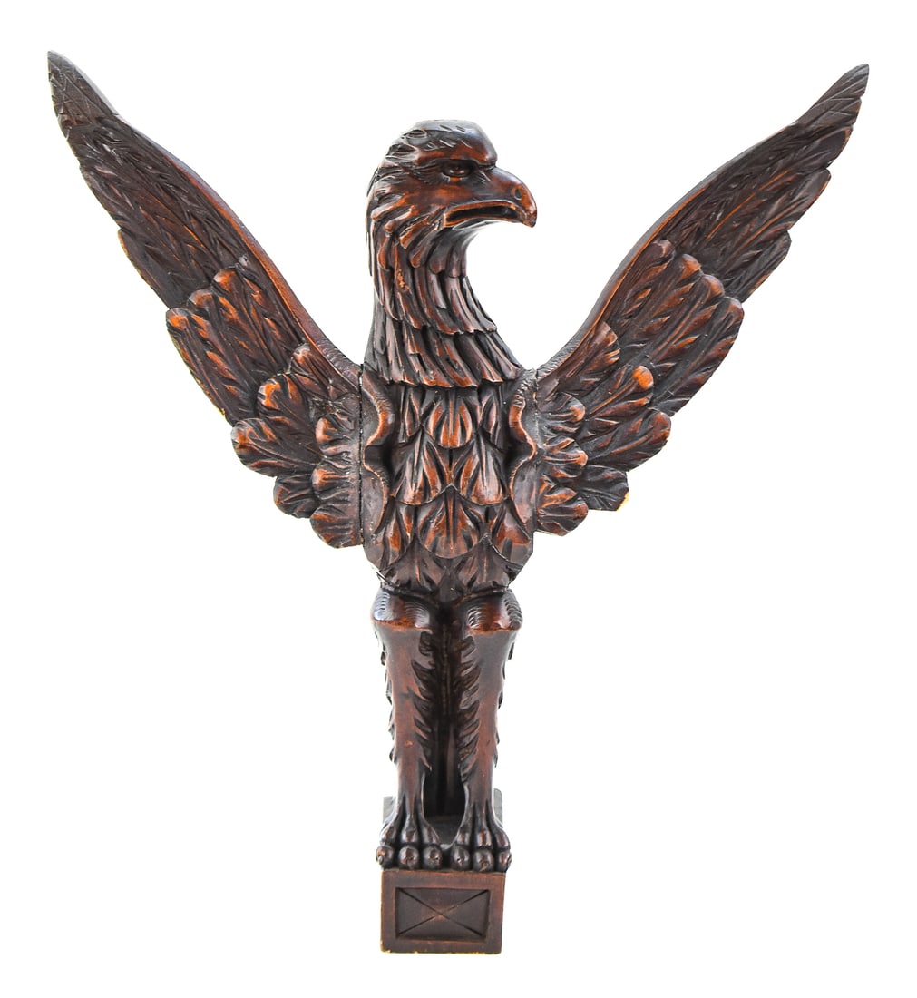 CONTINENTAL EUROPEAN STYLE CARVED EAGLE POST TOPPER: A Continental European-style carved wooden eagle post topper; likely Italian, from the late 19th century. The item measures approx. 19" H x 17.5" W x 6" D.