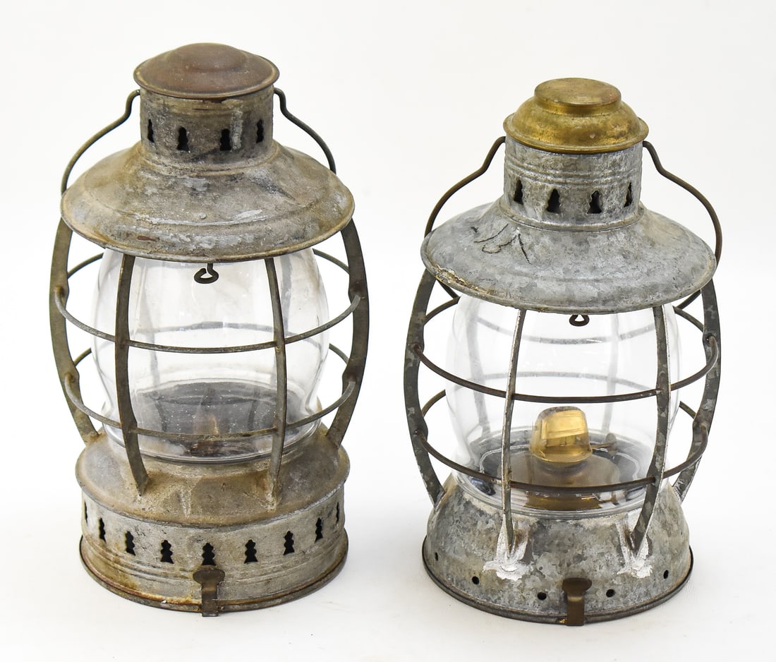 MARITIME LANTERNS: WILCOX, CRITTENDEN & COMPANY AND PERKINS MARINE & HARDWARE CORP.: This lot includes two galvanized steel maritime deck oil lanterns, circa 1920-1950s: Wilcox, Crittenden & Company (Middletown, CT) lantern with a makers label on the base and a Perkins Marine