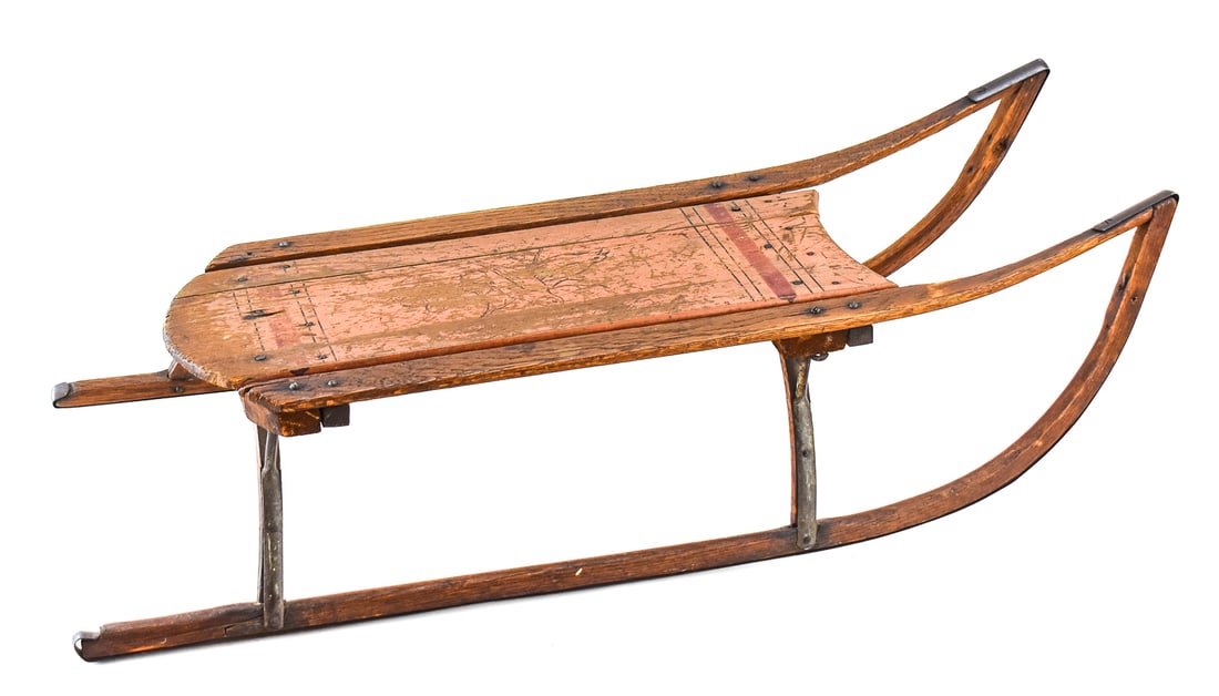AMERICAN PAINTED BENTWOOD SLED: An American hand-painted bentwood sled with a design of birds and grapes, from the late 19th-early 20th century. The sled measures approx. 9" H x 13.5" W x 33" D.
